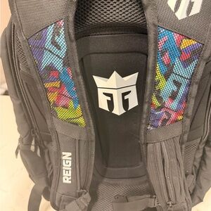 Reign Black Backpack with Multicolor Geometric Accents